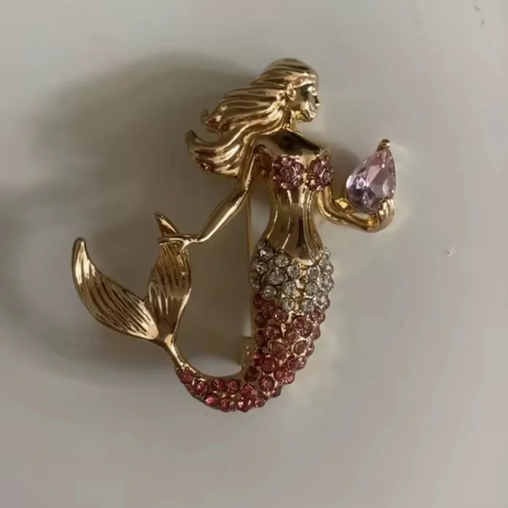 Anthropologie elegant gold